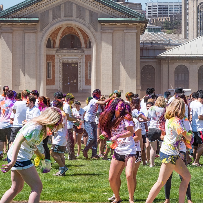 Students enjoying the Holi festival.