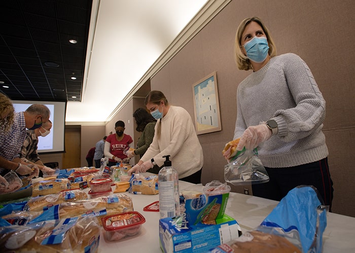 Packing meals for Light of Life Rescue Mission