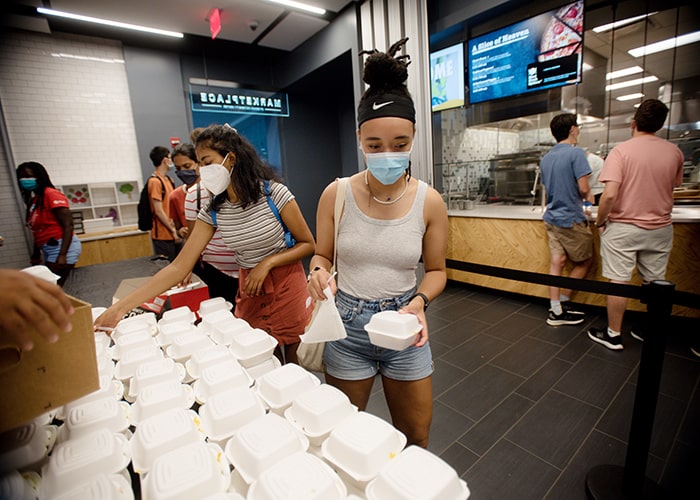 Students stand in line for Multicultural BBQ food