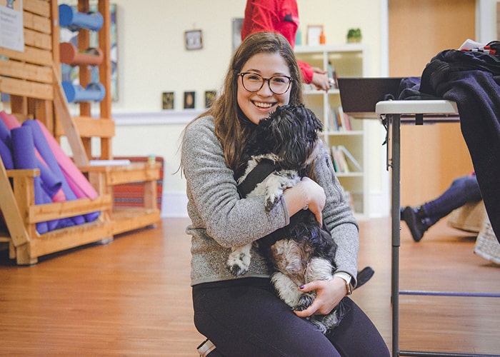 cmu student in the mindfulness room holding a bunny