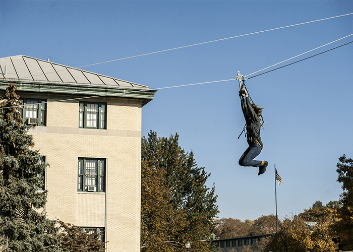 CMU student on a zipline