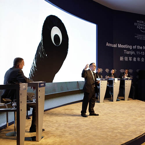 Golan Levin gives a presentation at WEF in China.