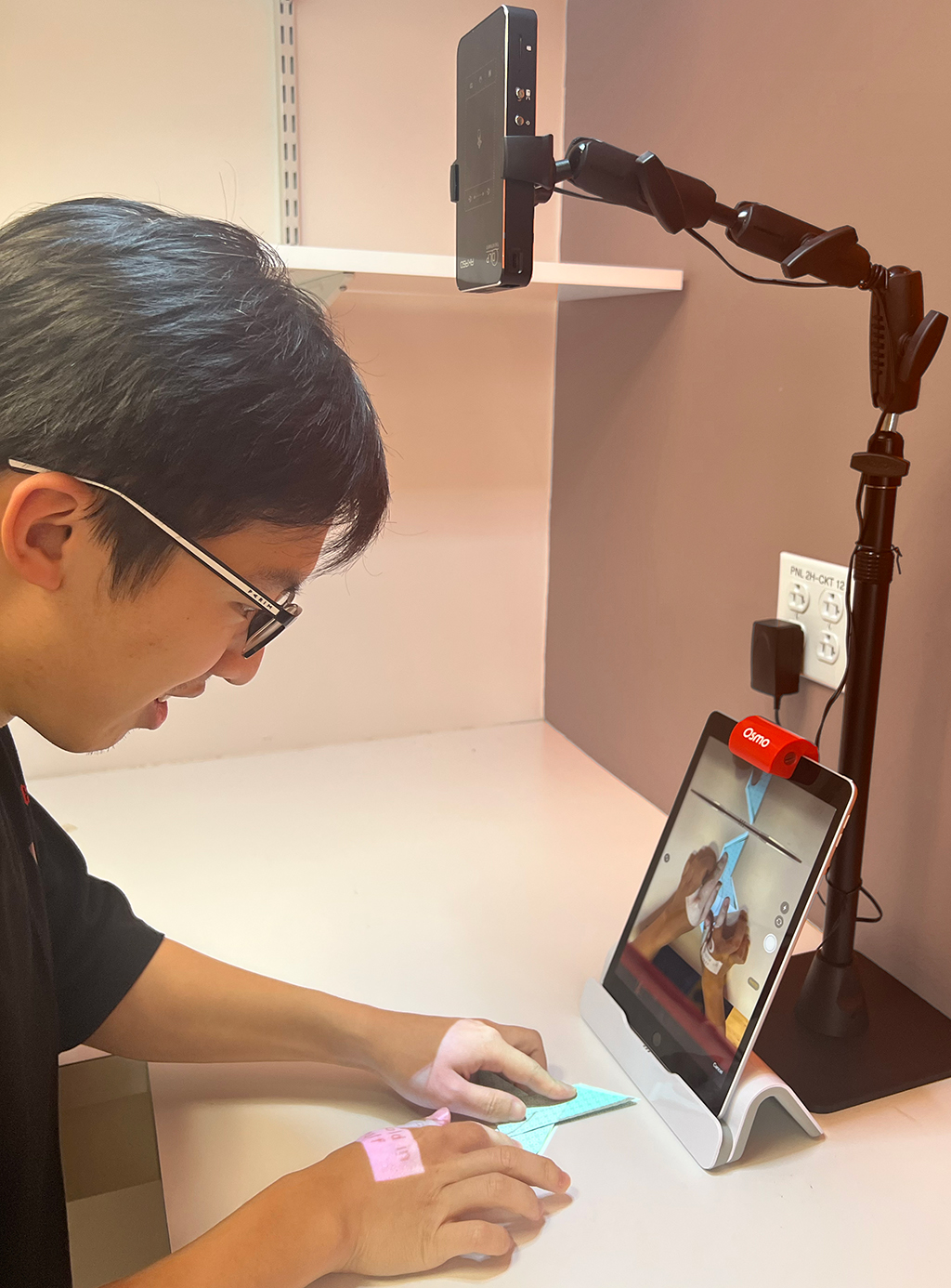 photo of man using mobile tablet